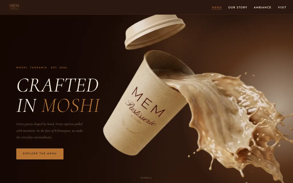 MEM Patisserie & Coffee homepage with the headline Crafted in Moshi beside a kraft coffee cup mid-splash
